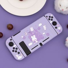 an image of a cell phone case that is decorated with cartoon characters and cats on it