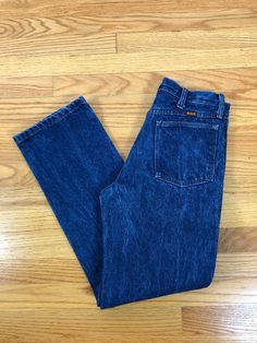 "Cool and classic vintage 90s mid- high waisted Rustler jeans. Feature a 1.5\" fitted waistband with 7 belt loops, branded metal button and 6\" zipper fly front closure. Has 5 pockets and straight legs. Made of a dark wash denim with slight acid wash. Freshly laundered and ready to wear. Label:\"Rustler\". Fiber content: 100% cotton Stamped size: 31 x 30. Please see measurements to ensure a proper fit. Condition: In great vintage condition, with light general wear throughout. Please see photos f Dark Wash High Waisted Jeans, Rustler Jeans, Western Rustic, Denim Cotton, Fall Collection, Dark Wash Denim, Fall Collections, Acid Wash, Classic Vintage