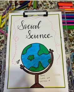 a sign that says social science with a drawing of the earth on top of it