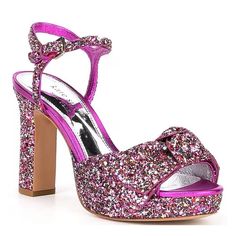 From Kate Spade New York, The Miya Glitter Platform Dress Sandals Feature: Synthetic Upper Bow Detail Adjustable Buckle Closure Leather Lining Synthetic Outsole Approx. 0.78" Platform Height Approx. 3.74 Heel Height New In Box Size 5.5 Pink Open Toe Heels With Glitter Accents, Spring Pink Glitter Heels, Sparkling Pink Heels For Spring, Purple Platform Heels For Party, Pink Glitter Heels For Night Out, Glamorous Purple Party Heels, Purple Block Heel Party Heels, Purple Block Heel Shoes For Night Out, Purple Block Heel Heels For Night Out