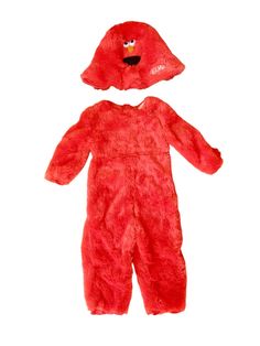 a red teddy bear with a hat on top of it's head and feet