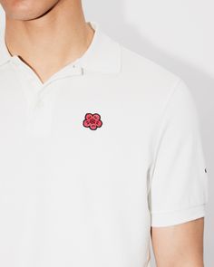 'Boke Flower' slim polo.'Boke Flower' logo as small crest embroidered.KENZO Paris logo on the upper back.Short sleeves.Buttoned polo shirt collar. Fitted Polo Shirt With Embroidered Logo, Casual Short Sleeve Polo Shirt With Logo Patch, Casual Polo Shirt With Logo Patch, Polo Shirt Collar, Kenzo Paris, Polo Design, Paris Logo, Scarf Pin, Polo Sweatshirt