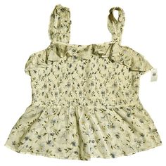 Old Navy Women's Size Xl Smocked Ruffle Pale Yellow Floral Tank Top Nwt Pit To Pit: 20" S-31 W8 Casual Smocked Top With Ruffles For Daywear, Casual Floral Print Smocked Top For Daywear, Sleeveless Smocked Top For Daywear In Spring, Sleeveless Smocked Top For Spring Daywear, Polka Dot Tank Top, Silk Tank Top, Purple Tank, Cowl Neck Top, Floral Tank Top