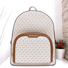 100% Michael Kors Authentic Guarantee And Firm Price! Details Backpack Logo-Print Canvas 89.4% Coated Canvas/9.6% Polyester/1% Polyurethane Trim: 60% Polyurethane /20% Polyester/20% Cotton Gold-Tone Hardware 12”W X 17”H X 7”D Exterior Details: Front Zip Pocket Interior Details: Back Zip Pocket, Tech Compartment, Front Slip Pocket Lining: 100% Polyester Zip Fastening Imported Michael Kors Backpack White, Michael Kors Rhea Backpack, Studded Backpack, Michael Kors Backpack, Leather Backpack Purse, Bags Michael Kors, Light Backpack, Exterior Details, Small Backpack