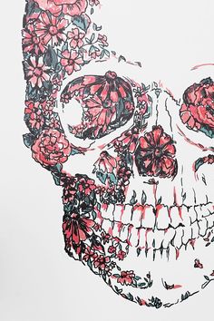 a drawing of a skull with flowers on it