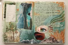 an open book with pictures and writing on the pages, including eyeballs in it