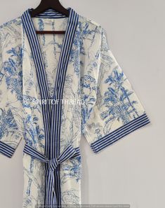 SPIRITOFTHREAD PRESENTING A NEW COTTON ROBE This kimono is made very neatly, and the matching strap has also been used in almost many places in the kimono, which makes the kimono very much. giving a beautiful look It looks good in the photo, but it looks great after wearing this kimono 100% Soft Cotton Hand Block Print Fabric Robe. The perfect to cover up your dance costume, to use for a dinner party or just slip into in on a beautiful summer morning. This particular beauty has a Japanese feelin Luxury Summer Sleep Kimono, Summer Sleepwear Kimono With Prints, Multicolor Summer Sleep Kimono, Luxury Blue Printed Kimono, Kimono Beach Cover Up, Kimono Beach, Blue Long-sleeved Cotton Kimono, Kimono Boho, Cotton Gowns