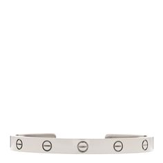 This is an authentic CARTIER 18K White Gold LOVE Cuff Bracelet size 18. The bracelet is crafted of 18 karat white gold and features the signature LOVE screw symbol motifs throughout the cuff. Bracelet Sizes, Cartier, Cuff Bracelet, Screw, White Gold, Cuff, Bracelet, Gold, White