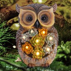 PRICES MAY VARY. High Quality: This garden figurine is made of high quality resin material, finished with a UV resistant coating, dust-proof and waterproof, can withstand rain, snow or scorching sun without cracking, fading or rusting. Owl Garden Decor: This owl resin statue is hand-painted with very nice details and good workmanship, designed with 8 succulents of 3 different colors, the center of the flower is decorated with warm white LED lights, emit a warm glow at night, add more charm to yo Owl Garden Decor, Outdoor Fall Decor Ideas, Owl Statue, Garden Owl, Garden Figurines, Warm White Led Lights, Solar Led Lights, Resin Statue, Lawn Ornaments