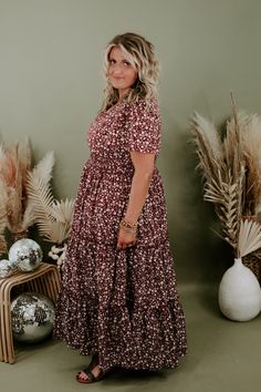 We are adoring the delicate floral pattern on this dress that makes it stand apart from the rest. Our Many Moments Floral Maxi Dress features a v-neckline, elastic waistband, cap flutter sleeves, and a three tiered design skirt. A true essential that transitions flawlessly throughout the seasons! Neckline: V-neckline Fabric: 100% Polyester Details: Lined, Elastic waistband, delicate floral print, tiered skirt Imported Fit: True to size; relaxed fit- Arms: Relaxed flutter sleeve- Chest: Relaxed- Modest Flowy Floral Dress For Casual Wear, Modest Flowy Floral Dress For Casual Occasions, Modest Floral Print Dress For Fall, Modest Floral Print Maxi Dress For Fall, Fall Ditsy Floral Maxi Dress, Fall Floral Print Short Sleeve Dresses, Short Sleeve Maxi Dress With Floral Print For Fall, Fall Floral Print Maxi Dress With Short Sleeves, Flowy Floral Print Maternity Midi Dress