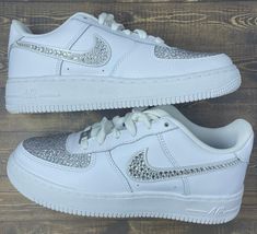 The famous Nike Air Force 1 but add a little bit of spice! These beautiful sneakers are blinged out on the Nike swooshes as well as the toe box. Rhinestones are hand placed on both the insides and outsides of the shoes *Depending on what color you choose for the rhinestones, shoes may be painted with high quality leather paint underneath the rhinestones to match * Many different sizes to choose from * Made to order * Sizes are in womens *Authentic Nikes bought from Nike store *Tested and promise Quinceanera Shoes, Swarovski Nike, Event Shoes, Bedazzled Shoes, Custom Air Force 1, Bling Shoes, Rhinestone Shoes, Cute Nike Shoes, Sneakers Athletic