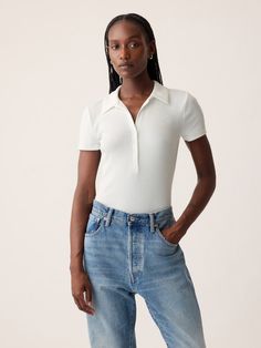 Soft, stretch modal-blend polo bodysuit.  Polo collar with snap button placket.  Short sleeves.  Snap button closure at inseam.  * Fit: Slightly fitted.  Sits close to the body.  Models wearing Gap White Polo Outfit Women, White Polo Outfit, Polo Bodysuit, Polo Outfit, Shirt Bodysuit, White Polo, Polo Collar, Women's Summer Fashion, Work Outfits