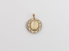 "Fabulous 14k Yellow Gold Virgin Mary Charm Pendant! Metal Purity: 14k Solid Gold , Stamped , Not plated Length: 3/4\" or 20 mm long Width: Almost 5/8\" or 15 mm wide Weight: 1.50 grams Complementary Gift Box There is a prayer around Mary which says: O Mary conceived without sin pray for us who have recourse to thee. This pendant is about the same size as a dime. Images may be enlarged to show detail and the item may look larger than it appears in person.In order to reduce buyer remorse and retu Commemorative White Gold Jewelry With Charms, Anniversary Miraculous Medal Round Pendant Jewelry, Elegant Commemoration Jewelry With Charms, Gold Jewelry With Miraculous Medal For Memorial, 14k Stamped Medallion For Anniversary, Gold Miraculous Medal Jewelry For Memorial, Anniversary Yellow Gold Jewelry With Miraculous Medal, Anniversary Yellow Gold Miraculous Medal Jewelry, Pray For Us