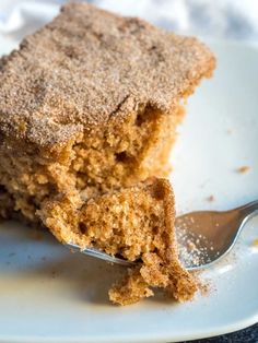 a piece of cake on a plate with a fork