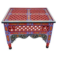 This is a 100% hand painted and hand carved Moroccan rectangular shape side table or end table. Great handcraftsmanship throughout, featuring the famous Moroccan Musharrabia woodwork. Beautiful add-on to your home or office decor. This table measures approximately 28" in length, 20" in width, and 22" in height. Also available in another size / color. A glass top was added for better look Old Window Frame, Moroccan Table, Moroccan Mosaic, Wooden Side Table, Mosaic Table, Fantastic Furniture, Paint Furniture, Coffee And End Tables, Patio Table