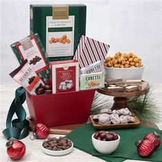 an assortment of holiday treats and snacks on a table