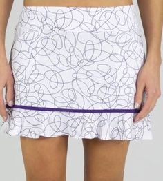 Featuring those cosmic swirls and that royal purple, you're going to love the coverage this skort provides. The ruffling detail gives it an extra feminine edge! Luxury Fitted Skirted Skort, Luxury Casual Spring Skort, Luxury Elegant Lined Skort, Luxury Classic Skort, Luxury Classic Spring Skort, Tennis Clothing, Tennis Apparel, Tennis Outfit Women, Tennis Gear