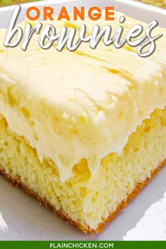 a close up of a piece of cake on a plate with the words orange brownies