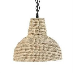 a light hanging from the ceiling with beads on it's end and black cord