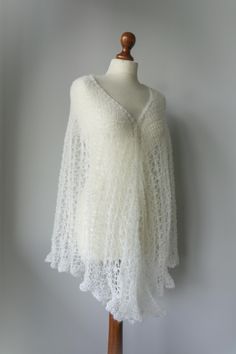 Handmade white lace shawl; wedding shawl ; lace shawl; bridal shawl; wedding accessories; wedding shawl ; white shawl for bride; bride to be This beautiful shawl is 100% hand-knitted.  Wonderful, lace and light purple shawl. It 's very elegant and feminine. So soft and gentle.  Made of high quality yarn - wool, mohair, polyacryl, Perfect for any time of year and any occasion.  Style: elegant  Measures: 212cm x 109cm Please read - notice To keep the shawl beautiful, soft and in perfect condition, you should only hand wash it in lukewarm water with a delicate soap. Don't use too much detergent. Don't use fabric softener. Don't iron. White Lace Shawl, Shawl White, Purple Shawl, Shawl Wedding, White Shawl, Bridal Shawl, Stil Elegant, Wedding Shawl, Lace Shawl