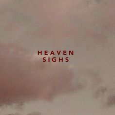 the words heaven signs are written in red on a cloudy sky with an airplane flying overhead