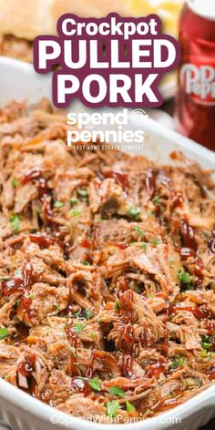 crockpot pulled pork in a white casserole dish