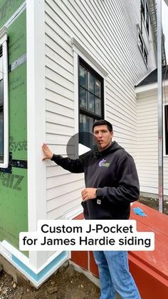 a man standing next to a house with the words custom j - pocket for james hardie sliding