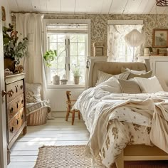 a bed sitting in a bedroom under a window next to a wooden dresser and chair