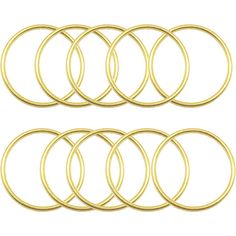 six pairs of gold colored metal rings