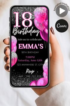 a person holding up a phone with an 18th birthday card on the front and back