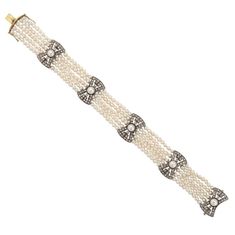 Beautiful five-strand pearl bracelet recalling the Belle Epoque, the lustrous pearls enhanced with five openwork 18k gold spacers in the shape of bows each set with 30 diamonds and centering a white half-pearl, mounted in silver and gold. Pearls measure 3 mm; central pearls averaging 4.5 mm diameter. 7 ¼ in. (18.4 cm.) long; width of diamond spacers: 3/4 in. (1.9 cm) wide. 20th century Diamond Gold Bracelet, Cultured Pearl Bracelet, White Gold Bangle, 18k Gold Bracelet, Gold Link Bracelet, Yellow Gold Bangle, Antique Bracelets, Pearl Bangle, Rose Gold Studs