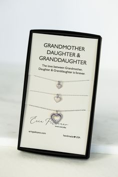 "Grandmother Set Hearts A fine Sterling Silver Grandmother necklace set represents the lifelong bond and love between generations of women The grandmother's necklace is a beautiful Heart pendant necklace with two size heart charm necklaces, one for daughter and one for granddaughter, ready to share and cherish. Presented on a Grandmother, Daughter & Granddaughter card that reads, \"The love between a Grandmother, Daughter & Granddaughter is forever.\" Proudly Made in America. Necklaces arrive in Anniversary Hallmark Charm Necklace For Mother's Day, Round Pendant Necklace With Hallmark For Mother's Day, Mother's Day Anniversary Gift Birthstone Necklace, Double Heart Necklace For Anniversary And Mother's Day, Heart Birthstone Necklace - Gift For Mom, Anniversary Open Heart Charm Necklace With Birthstone, Heart Necklace With Birthstone As Gift For Mom, Anniversary Open Heart Birthstone Charm Necklace, Mother's Day Double Heart Necklace Gift For Her