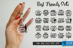 a person holding up a glass keychain with the words best friends on it