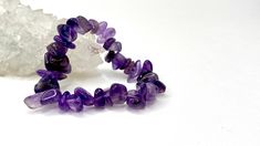 Amethyst Chips Bracelet You will receive 1 (ONE) Amethyst Chips Bracelet similar to the item in the picture Great for mixing and matching with other regular bracelets. . Amethyst has healing powers to help with physical ailments, emotional issues, and in Energy Healing and Chakra balancing. Amethyst crystal therapies are primarily associated with physical ailments of the nervous system, the curing of nightmares and insomnia, and balancing the crown chakra. FOLLOW US ON INSTAGRAM @earthsmineralsi Spiritual Purple Beaded Bracelets With Stones, Purple Crystal Bracelet For Gift, Amethyst Beaded Bracelet For Healing, Purple Spiritual Crystal Bracelet With Stones, Spiritual Purple Crystal Bracelet With Stones, Adjustable Purple Crystal Bracelet With Stones, Adjustable Purple Crystal Bracelet, Crystal Chips, Crystal Therapy