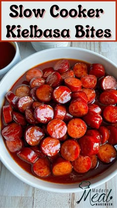 slow cooker kielbasa bites in a bowl with ketchup on the side