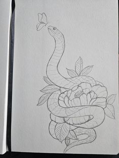 a pencil drawing of a snake on top of a flower