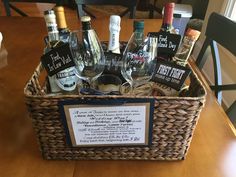 a wicker basket filled with liquor bottles