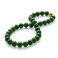 Since 1861, Gump's has been a destination for jewelry that is distinctive, extraordinary and timeless — and our jade collection is no exception. Once considered more precious than gold, jade has been more highly prized in Asia than any other gemstone. Treasured for thousands of years, it represents harmony, balance and protection, and is thought to bring good luck to the wearer. Green nephrite jade, 12mm. Diamonds, 0.06ctw. 18-karat yellow gold. 17"L. Extraordinary Jewelry, Jewelry By Material, Nephrite Jade, Jade Necklace, Timeless Jewelry, Jade Beads, Jade Green, Turquoise Bracelet, Jewelry Shop