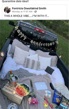 an open truck bed filled with food and drinks