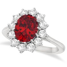 a red and white diamond ring on a white background with the center stone surrounded by smaller diamonds