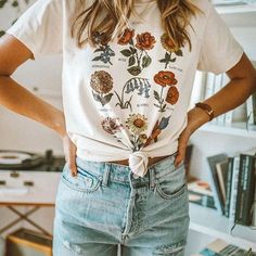 Apr 20, 2020 - colorful flower chart shirts boho flowers print tee white floral t shirt short sleeve floral summer tops #floral #tee #shirts #tshirt #flower White Vintage Print T-shirt For Spring, White Casual T-shirt With Vintage Print, Vintage White Tops With Plant Print, White Tops With Vintage Print For Spring, White Top With Vintage Print For Spring, Spring White Printed T-shirt, Cute White T-shirt With Plant Print, Casual Floral Print Relaxed Fit T-shirt, Casual Relaxed Fit Floral Print T-shirt