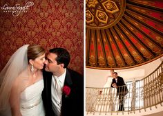 the bride and groom are kissing on the balcony next to the staircase at their wedding