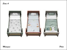 three small beds in different sizes and colors