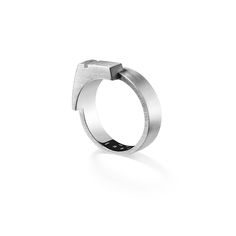 ✕Product Details Solid silver men's signet ring with asymmetric design and Ursul notch. Matt brushed finish. - Silver ring 925/000 - Rhodium finish - Brushed finish - Width: 8mm - Weight: 11g - Made in France +Designer The creator, Alexis Théry. Its primary weapons: luxury materials, leather and metal, handled with finesse. His quest: a permanent dialogue between suppleness and firmness, warmth and radiance, matt and shine… The incessant search for purity of lines for a graphic marriage. Birth o Mens Silver Signet Ring, Luxury Materials, Printable Ring Sizer, Double U, Signet Ring Men, Silver Signet Ring, Bagan, Vermeil Jewelry, Ring Sizer