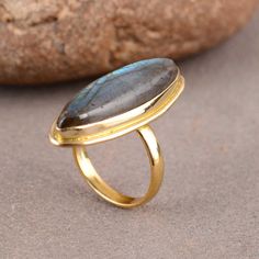 "Simple Labradorite Ring Gold Marquise Shape Blue Flashy Stone Handmade Ring Long Stone Band Ring Engagement Ring Women IMPORTANT NOTE....👇 free surprise gift on purchase of 1 product. 2 rings free gifts on purchase of 5 products. ❥ Customers' satisfaction is our biggest priority, please contact us with any questions/queries for future or existing orders, and we will do our best to make sure you are happy with your order. ❥Please make sure to add the correct address during checkout. You can ret Bohemian Jewelry With Bezel Setting As Gift, Bohemian Jewelry With Bezel Setting For Gift, Turquoise Moonstone Ring With Natural Stones As Gift, Turquoise Toe Ring As Gift, Labradorite Rings With Natural Stones For Gift, Gold Turquoise Ring With Large Stone As Gift, Labradorite Jewelry With Bezel Setting As Gift, Blue Labradorite Ring, Labradorite Jewelry With Bezel Setting For Gift