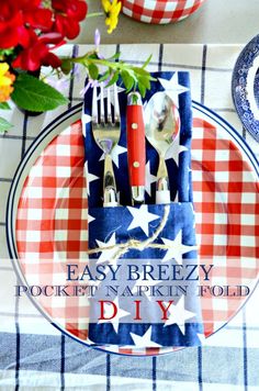 an american flag place setting with red, white and blue napkins