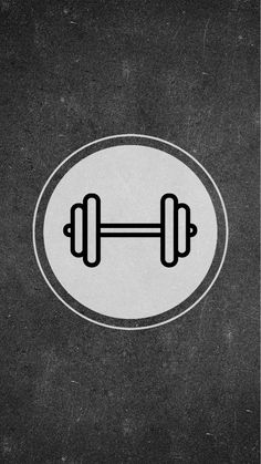 a black and white image of two dumbbells in a circle on the ground