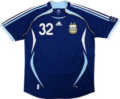 a soccer jersey with the number 32 on it is blue and has white trims