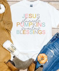 This Jesus Flannels Pumpkins Sweaters Blessings Graphic Shirt will be your go to shirt this fall! Perfect for dressing up or down, you can wear this to any fall festivity throughout the season! Pair with a flannel shirt and booties for a stylish look this fall!

* 6 oz., 100% preshrunk cotton * Classic fit * Seamless double needle 7/8" collar * Taped neck and shoulders * Double needle sleeve and bottom hems * Quarter-turned to eliminate center crease Fall Football, Monogram Shirts, Black Friday Christmas, Long Sleeve Denim Shirt, Rain Gear, Dressing Up, Fall Festival, Graphic Shirt, Girly Girl