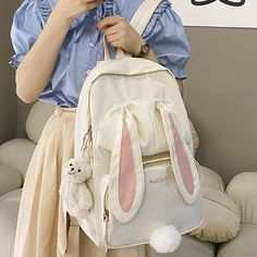 Cute Rabbit Large Capacity Kawaii Backpack BE057 Main Material: NylonTechnics: JacquardBackpacks Type: SoftbackCapacity: 20-35 LitreInterior: Cell Phone PocketInterior: Interior Zipper PocketInterior: Computer InterlayerHandle/Strap Type: Soft HandleItem Type: BackpacksDecoration: AppliquesClosure Type: zipperRain Cover: NoExterior: Solid BagCarrying System: Air Cushion BeltLining Material: PolyesterPattern Type: Cartoon 3d Rabbit, Preppy Mode, Rabbit Tail, Bunny Backpack, Cute School Bags, Kawaii Bags, Kawaii Backpack, Style Kawaii, Fluffy Bunny